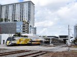 Charger # 121 leading a southbound Brightline train out of WPB Station, enroute from Orlando Airport to Miami Central Station